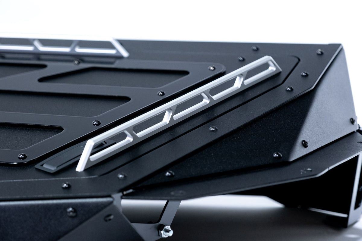 Overhead view of Can-Am Maverick X3 Baja Bed Box showing tie-down rail layout on lid