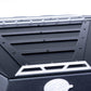 Gear strapped to tie-down rails on top of Polaris RZR Baja bed box lid