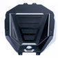 Polaris RZR Baja bed box shown with lid open and gear stored inside