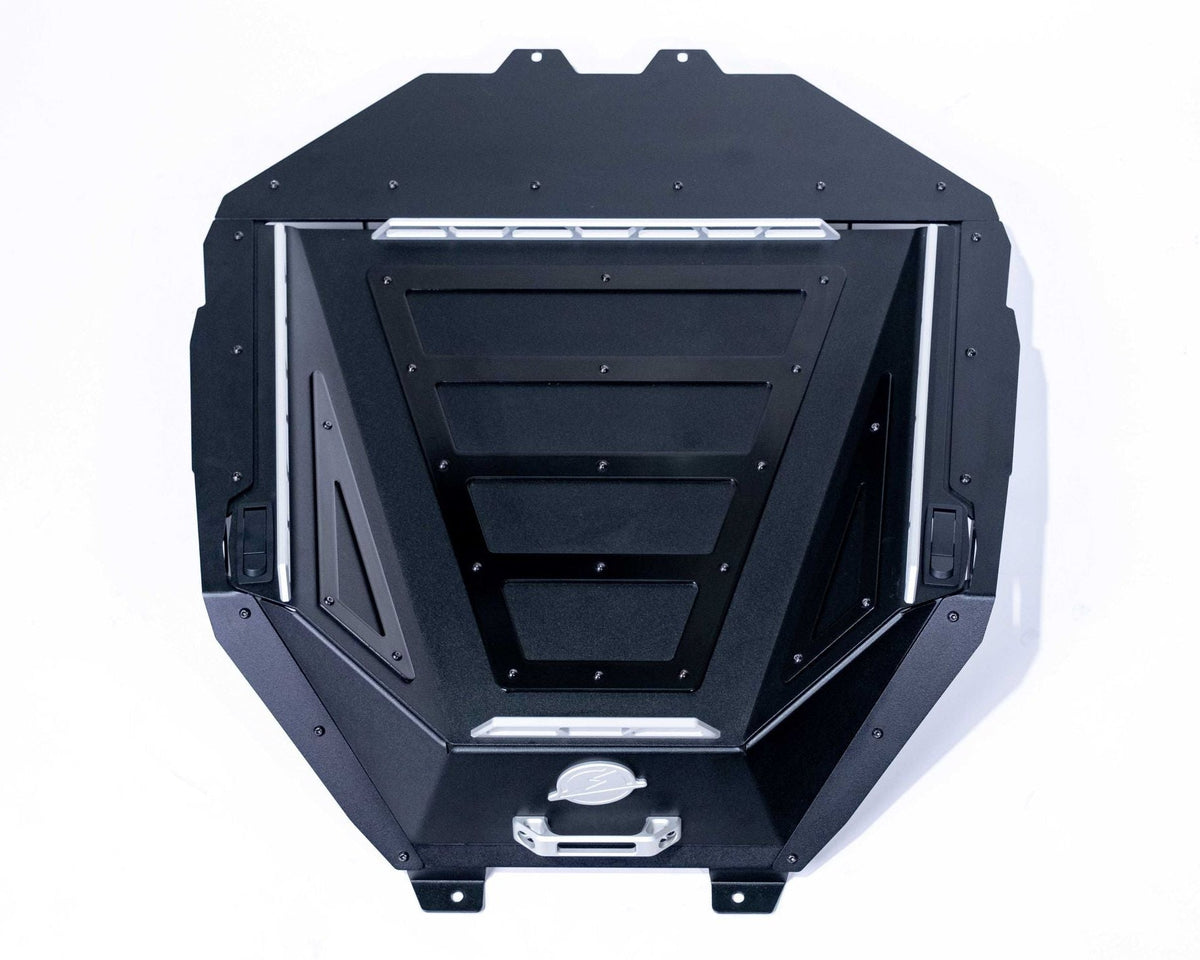 Polaris RZR Baja bed box shown with lid open and gear stored inside