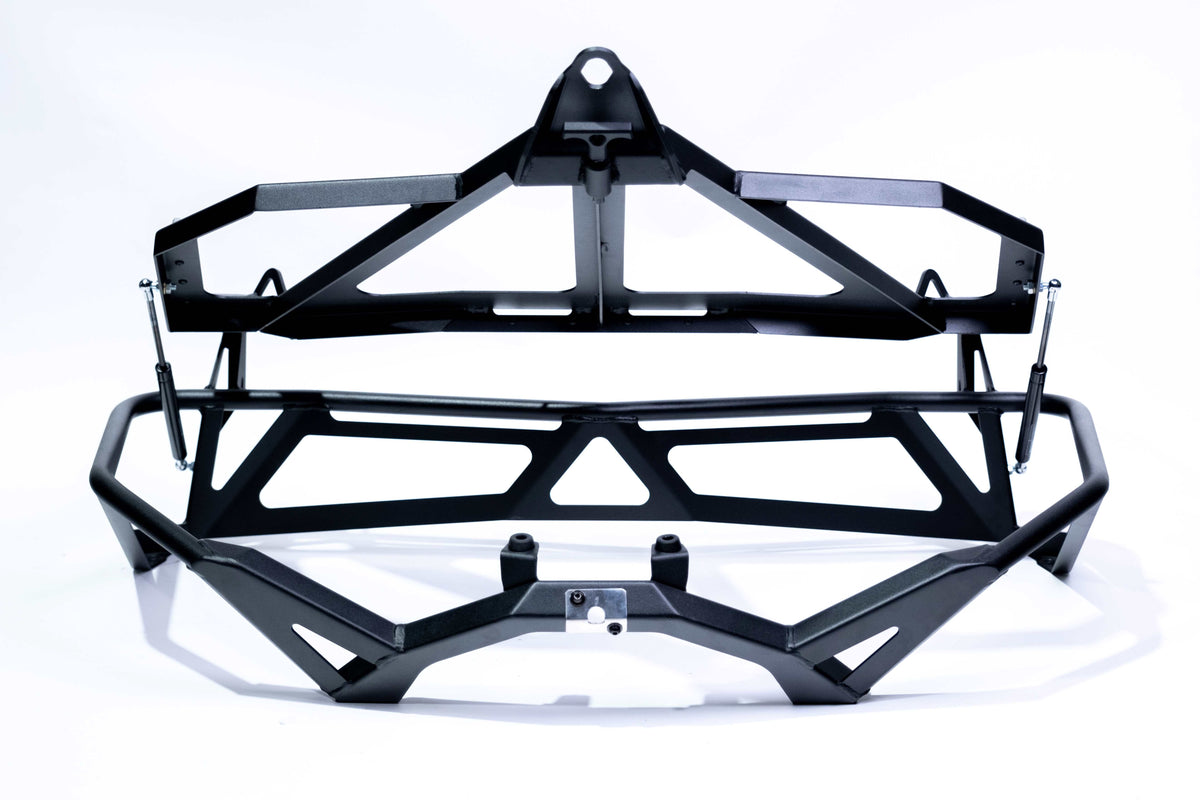 Gas strut assisted lid mechanism on Can-Am Maverick X3 Baja tire rack revealing storage