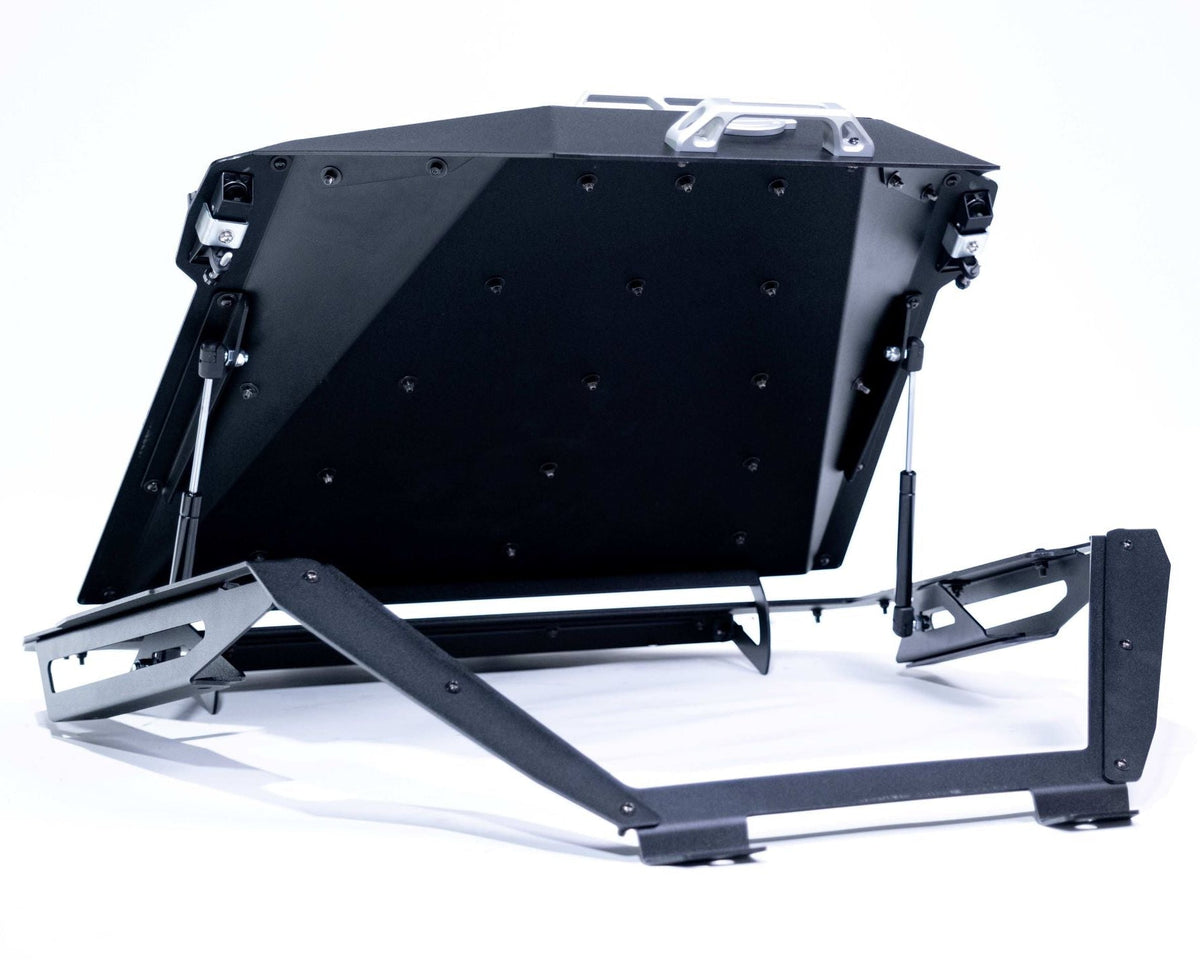 Billet aluminum tie-down rails on top of Polaris RZR Baja bed box lid