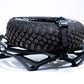 Tool storage compartment open on Can-Am Maverick X3 Volt Series Baja tire rack