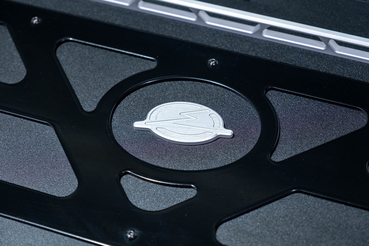 Billet aluminum badge detail on Can-Am Maverick X3 Baja Bed Box