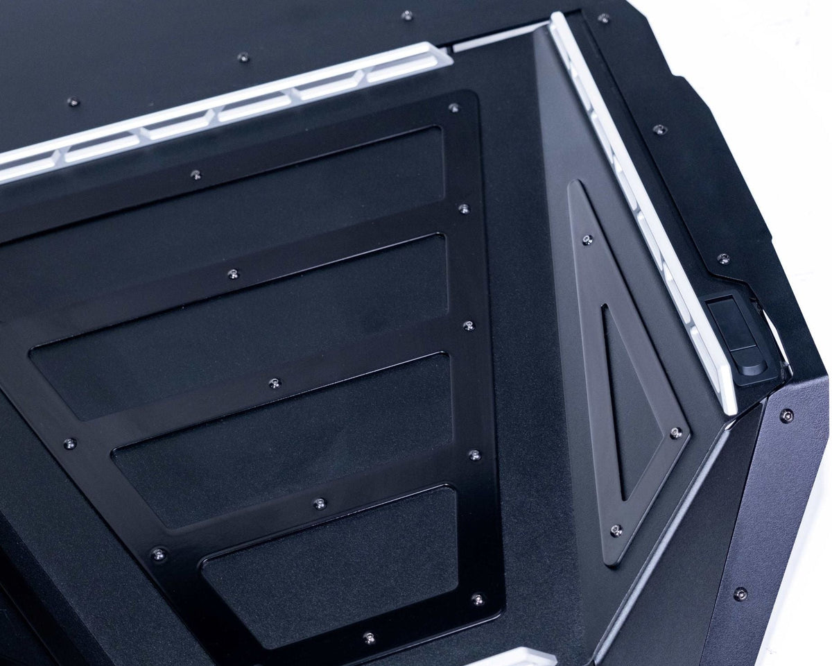 Billet aluminum badge detail on Polaris RZR Volt Series Baja bed box