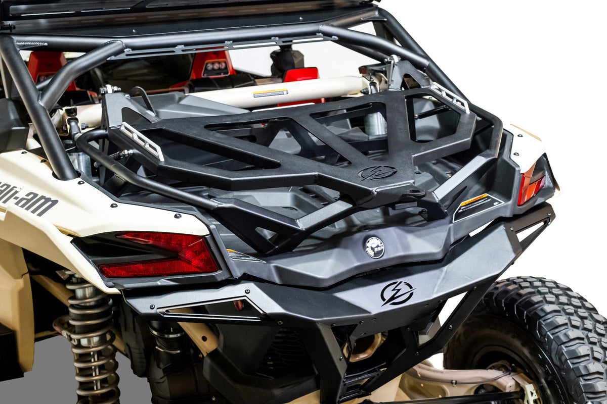 Volt Series Baja Spare Tire Rack installed on Can-Am Maverick X3 with 35-inch spare tire mounted and hammer black finish