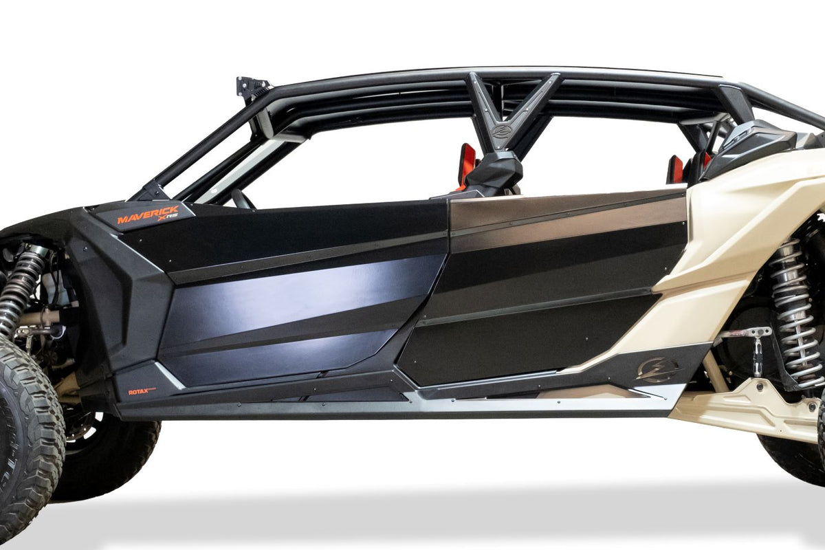 Driver side Volt Series Rock Sliders installed on 4-seat Can-Am Maverick X3 showing frame side protection