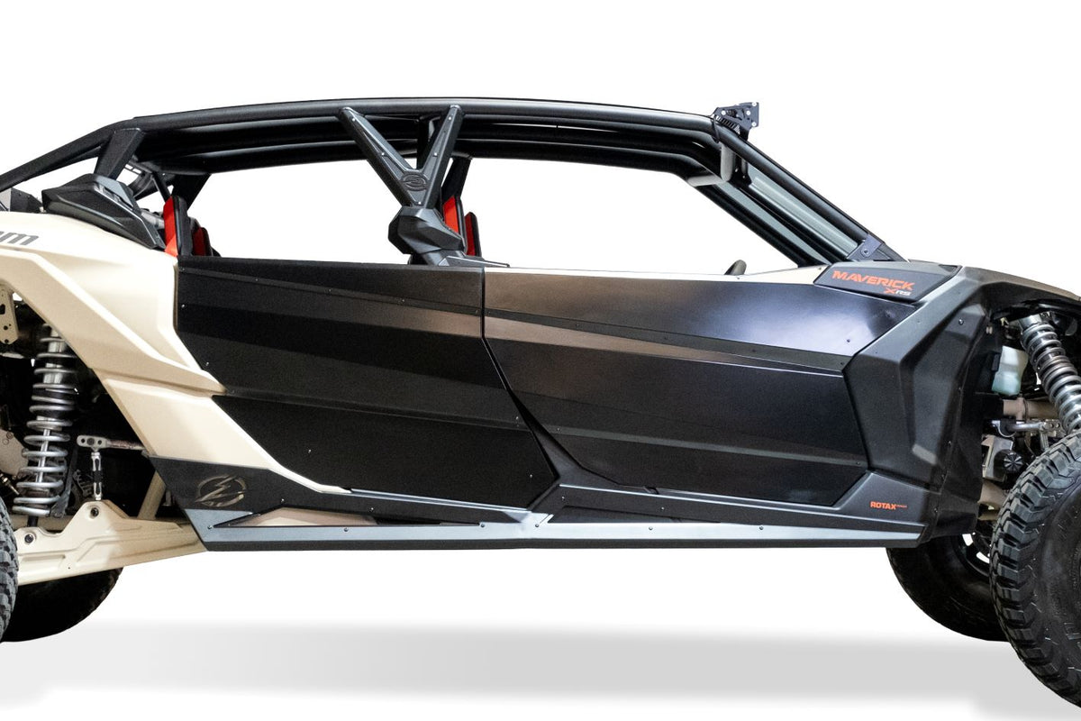 Volt Series Rock Sliders installed on 4-seat Can-Am Maverick X3 showing steel side protection and hammer black finish