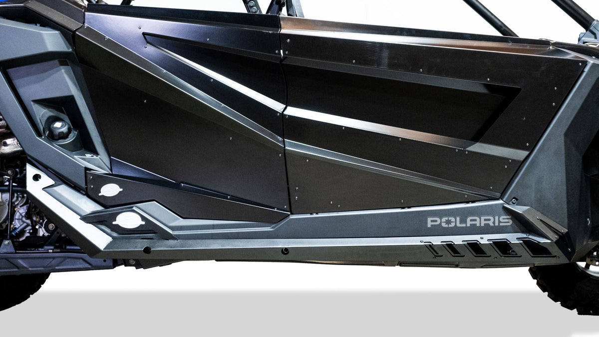 Mounting bracket detail on Polaris RZR 4-seat Volt rock sliders