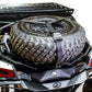 Hold down mount and Y strap detail securing spare tire on Can-Am Maverick X3 Baja rack
