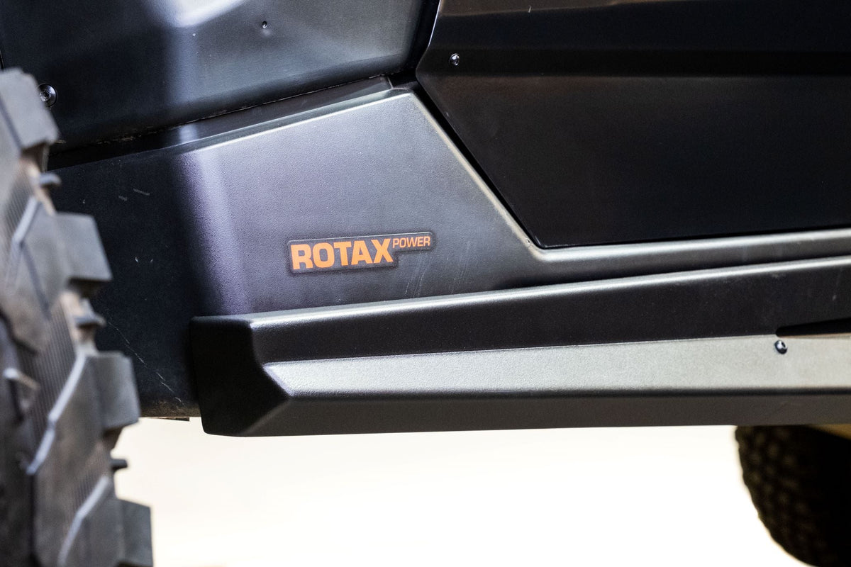 Bolt-on mounting point detail on Can-Am Maverick X3 Volt Series Rock Sliders showing factory frame attachment