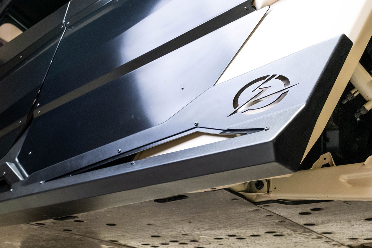 Passenger side Volt Series Rock Sliders on 4-seat Can-Am Maverick X3 showing body protection