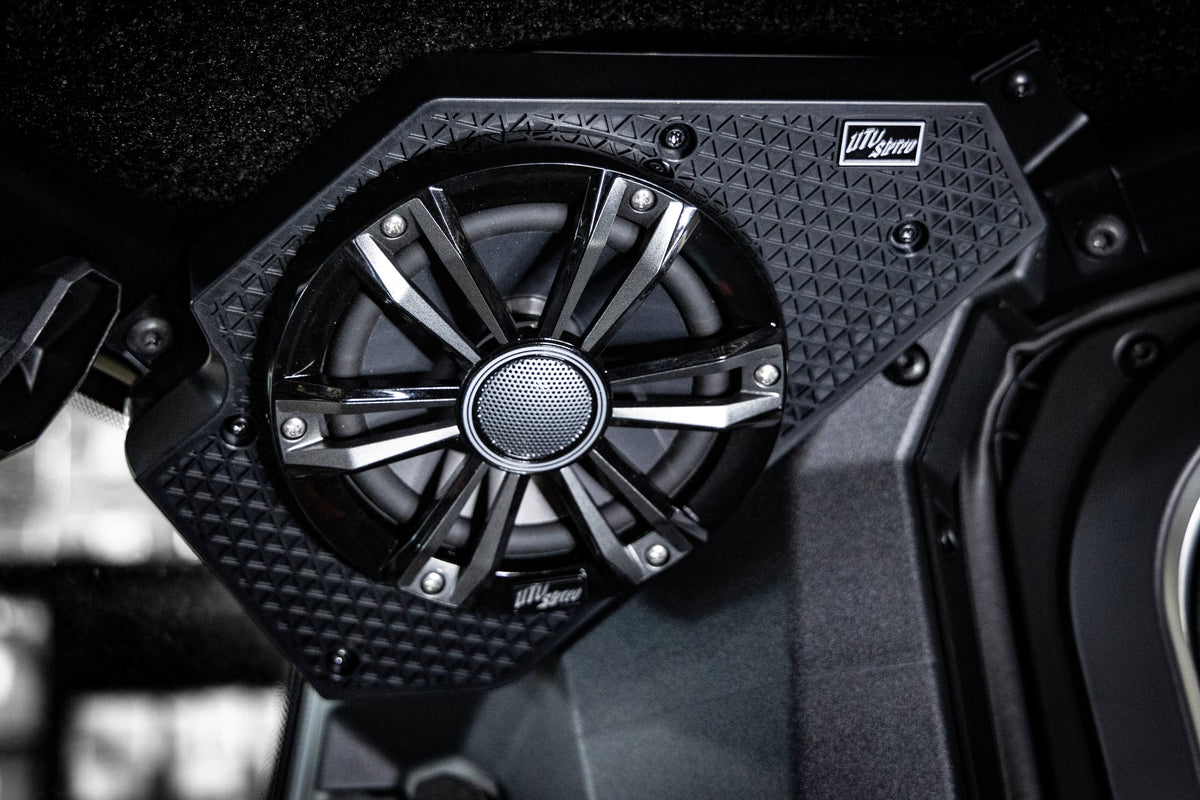 UTV Stereo speaker mounted in a vehicle interior