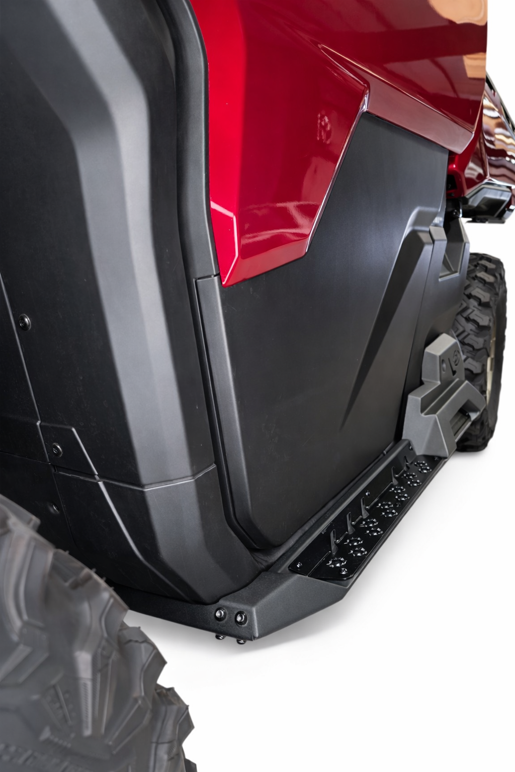 Bolt-on mounting point detail on Can-Am Defender 2-seat Volt Rock Steps showing factory frame attachment