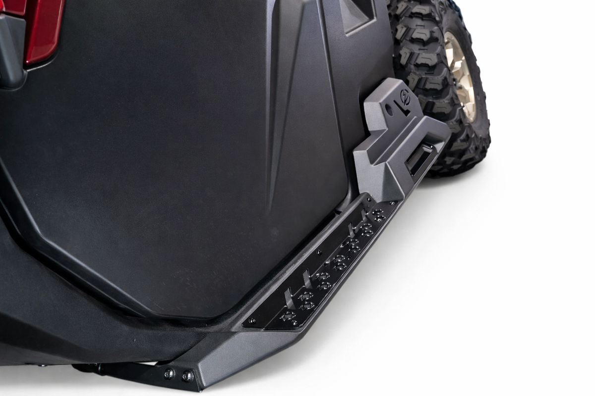 Passenger side Volt Rock Steps on 2-seat Can-Am Defender showing body protection and step