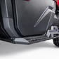 Driver side Volt Rock Steps installed on 2-seat Can-Am Defender showing frame protection