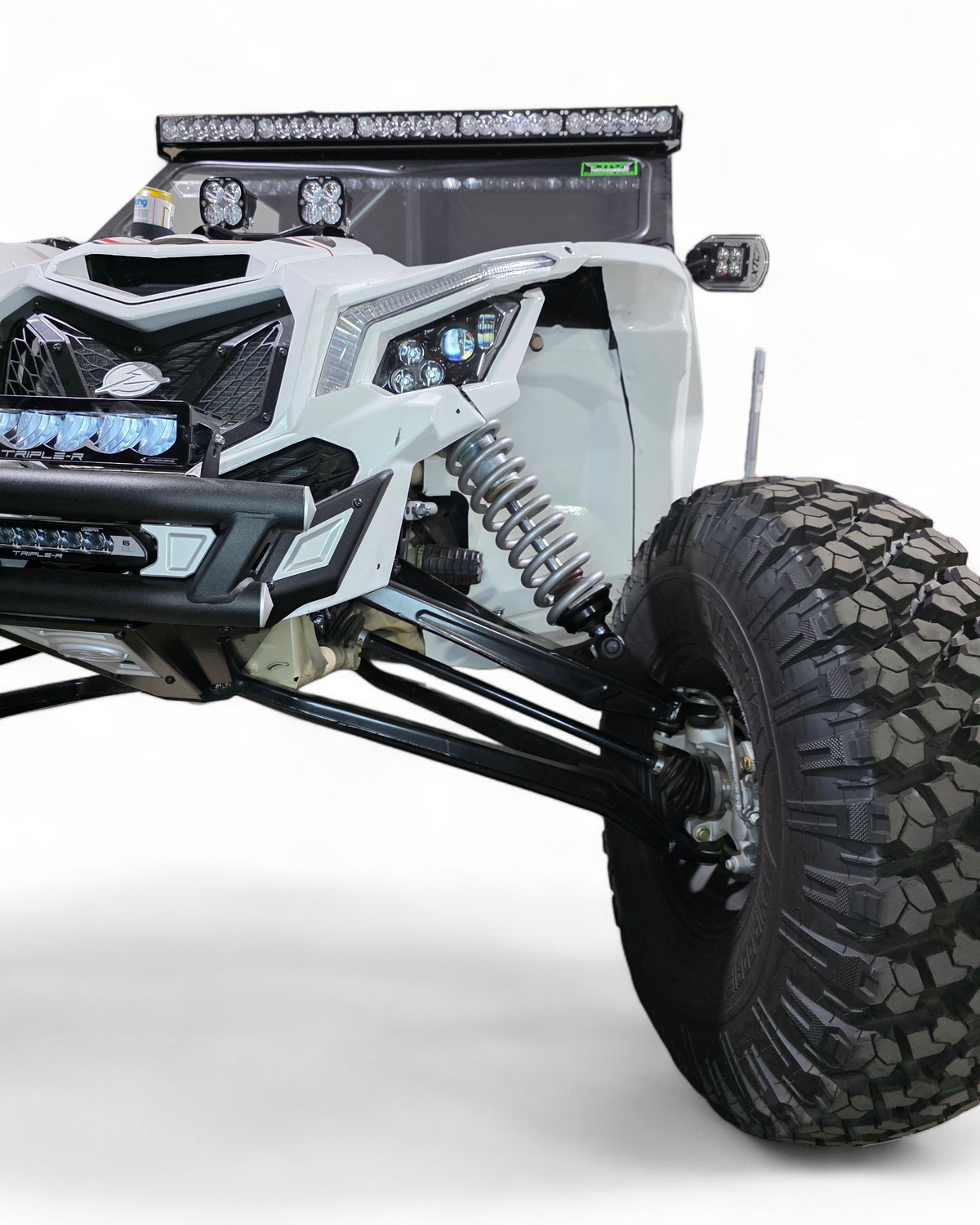 Can-Am X3 billet tie rod showing factory rod end compatibility