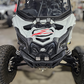 Can-Am Maverick X3 black billet upper shock mount brace shown solo displaying full construction and light mount