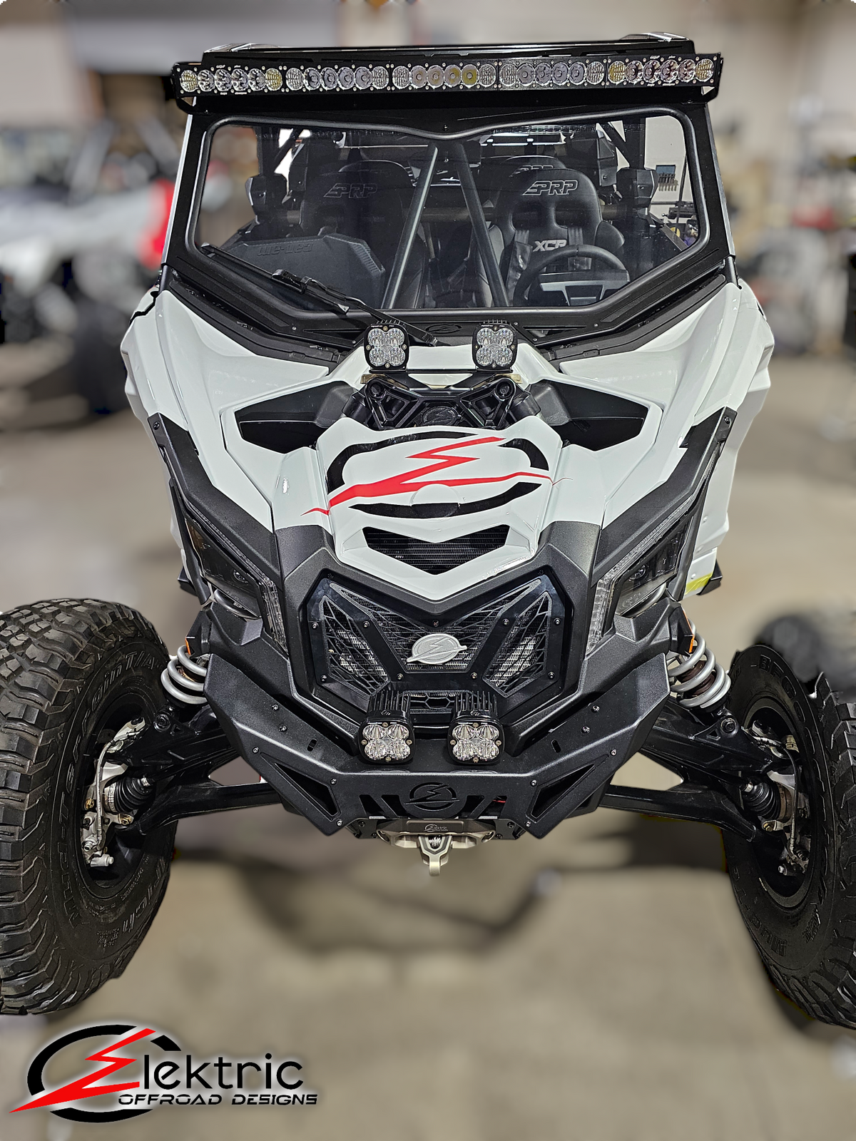 Can-Am Maverick X3 black billet upper shock mount brace shown solo displaying full construction and light mount