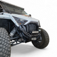 Polaris RZR Pro XP front bumper shown with lights mounted for night visibility
