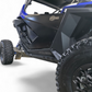 Side profile of 2-seat Polaris RZR Pro R with Volt rock sliders installed