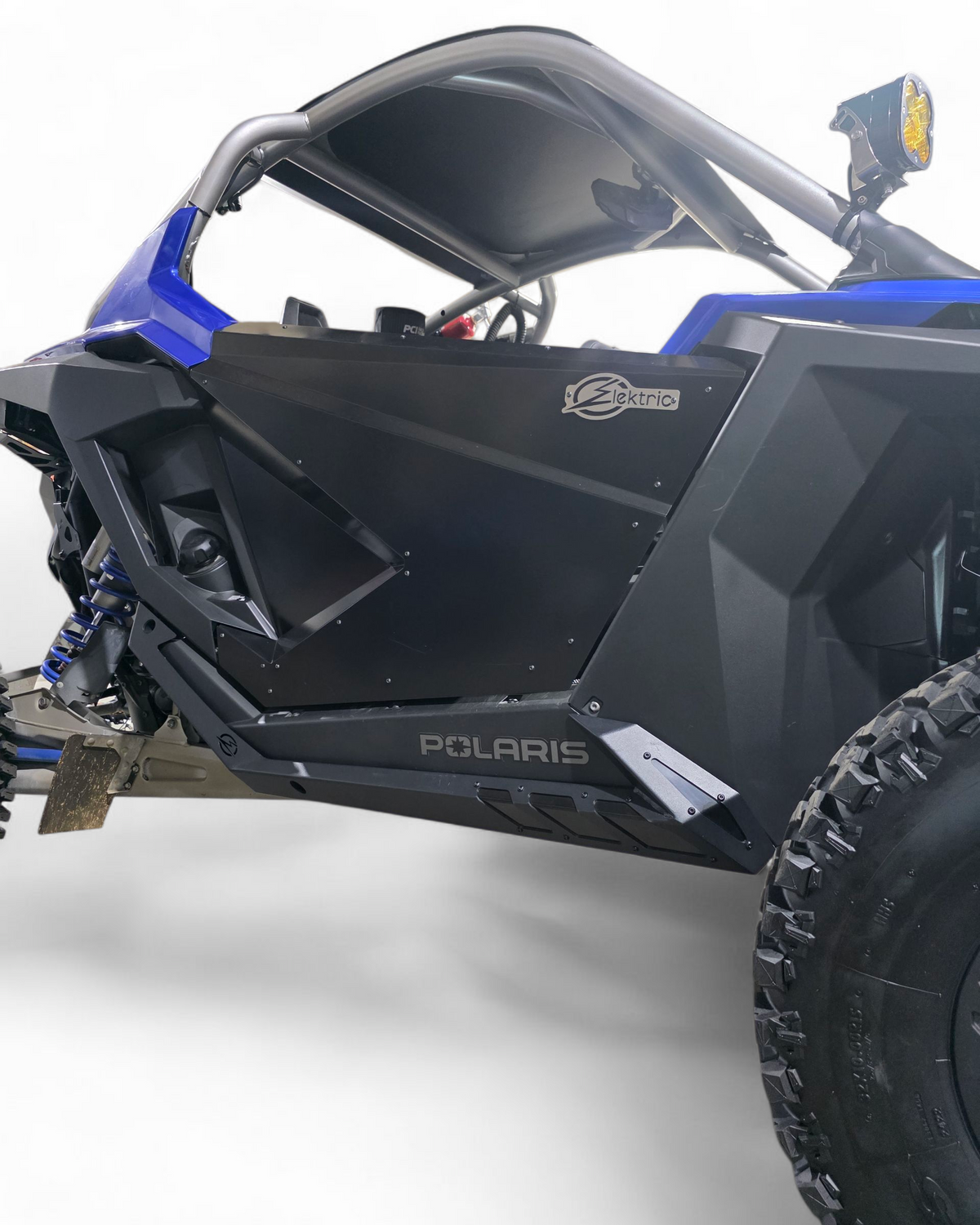 Volt Series Rock Sliders installed on 2-seat Polaris RZR Pro R showing steel construction and hammer black finish