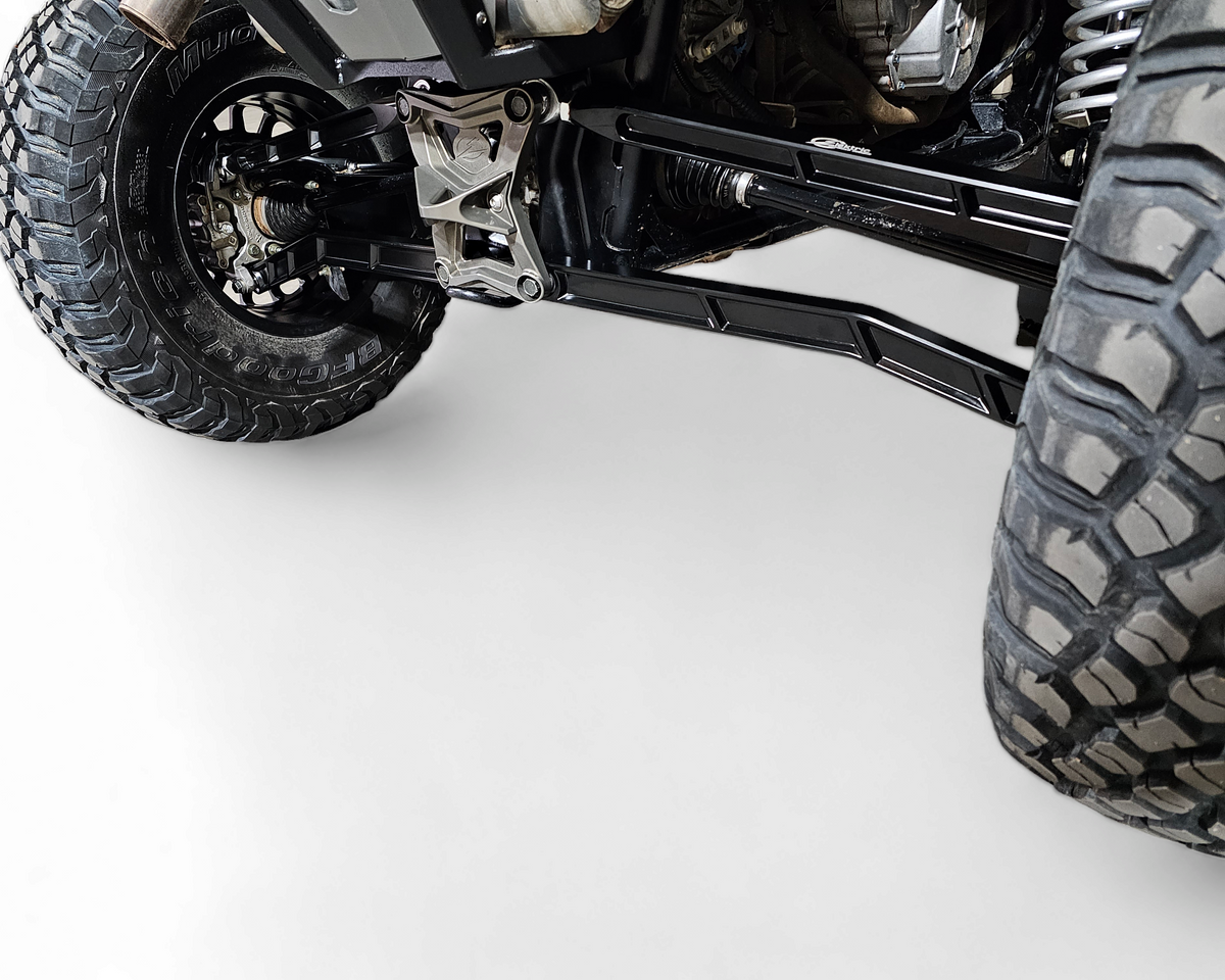Side view of Polaris RZR Pro XP billet radius rod showing bolt-in mounting