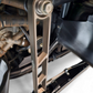 Close-up of gunmetal anodized finish texture on Polaris RZR Pro XP sway bar link