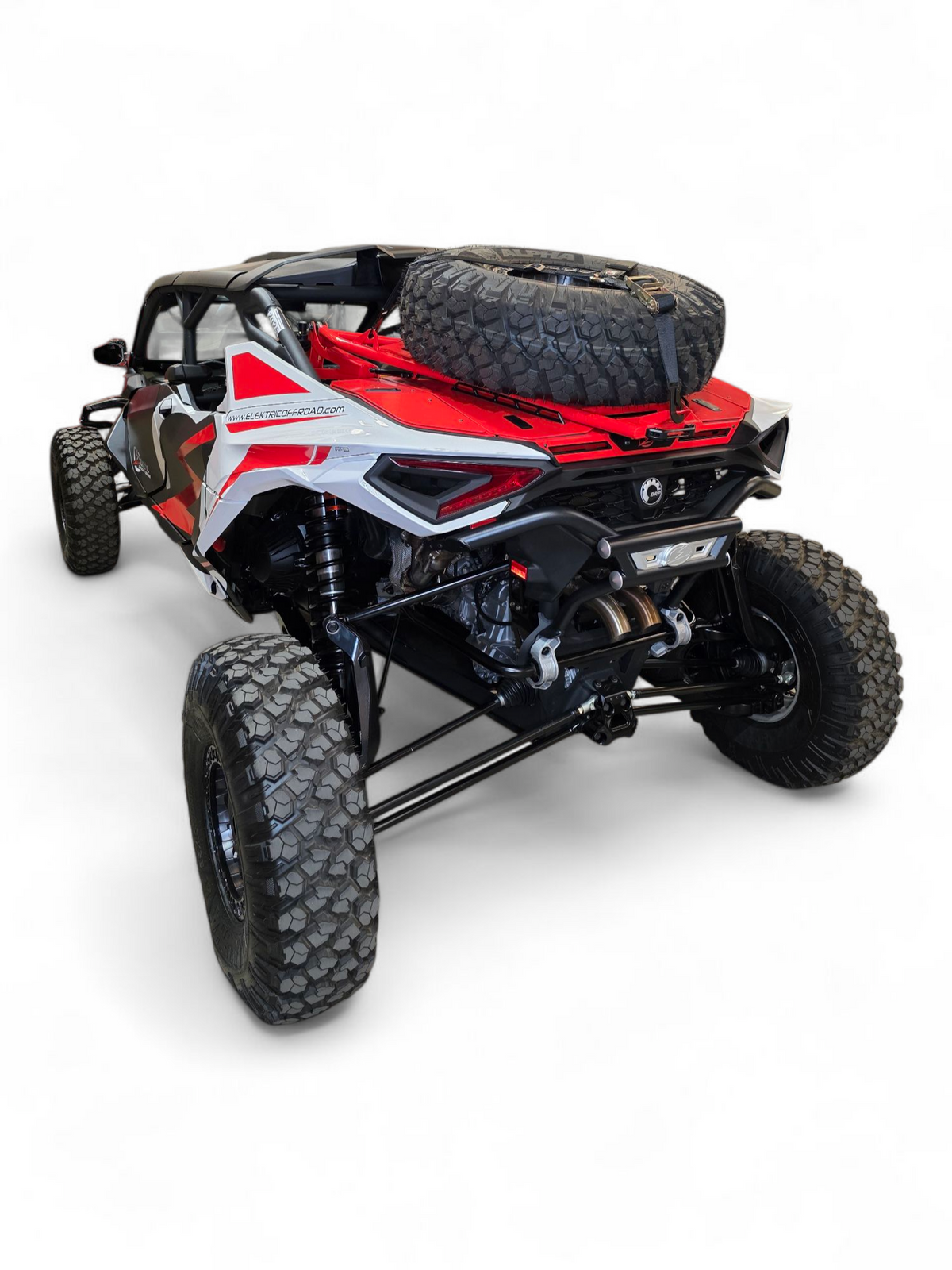 Rear three-quarter view of AMP Rear Bumper on 2024 Can-Am Maverick R showing aggressive profile and body-line integration