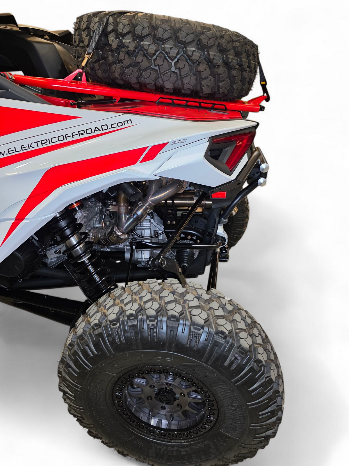 Close-up of AMP Rear Bumper billet end cap on Can-Am Maverick R