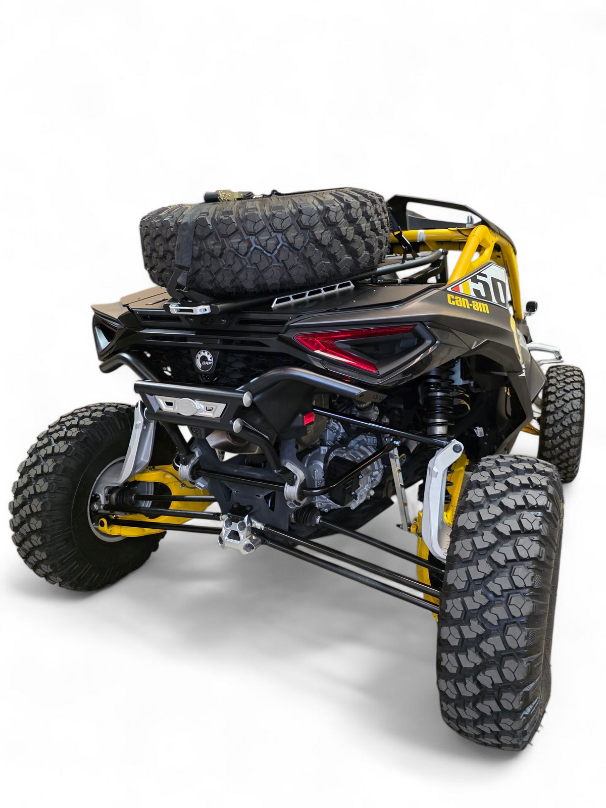 Full machine rear view of Can-Am Maverick R fitted with AMP Rear Bumper and aggressive stance