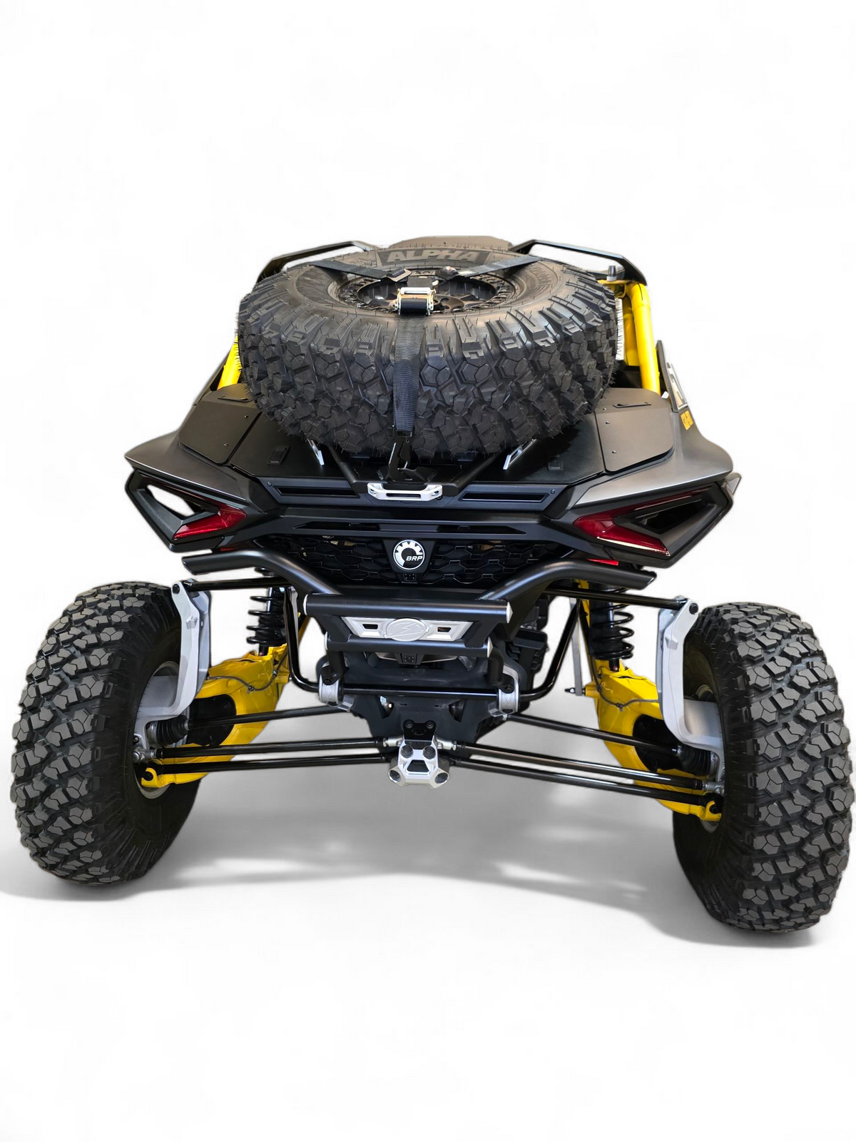 Trail action shot of Can-Am Maverick R with AMP Rear Bumper installed