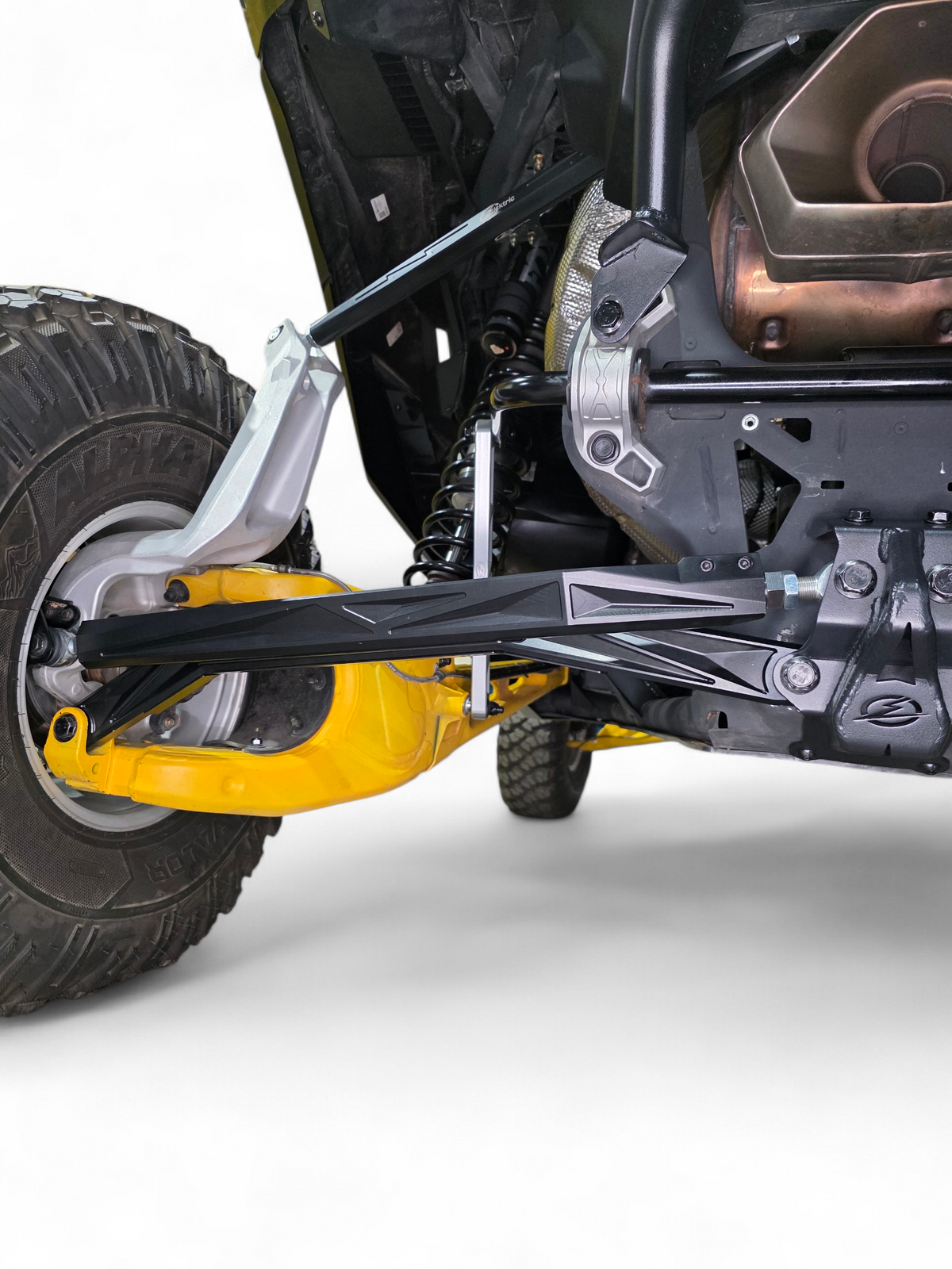 Close-up of adjustable Heim joint on 2024+ Can-Am Maverick R High Clearance
    Radius Rod showing anodized black 6061 billet aluminum construction and
    threaded adjustment detail