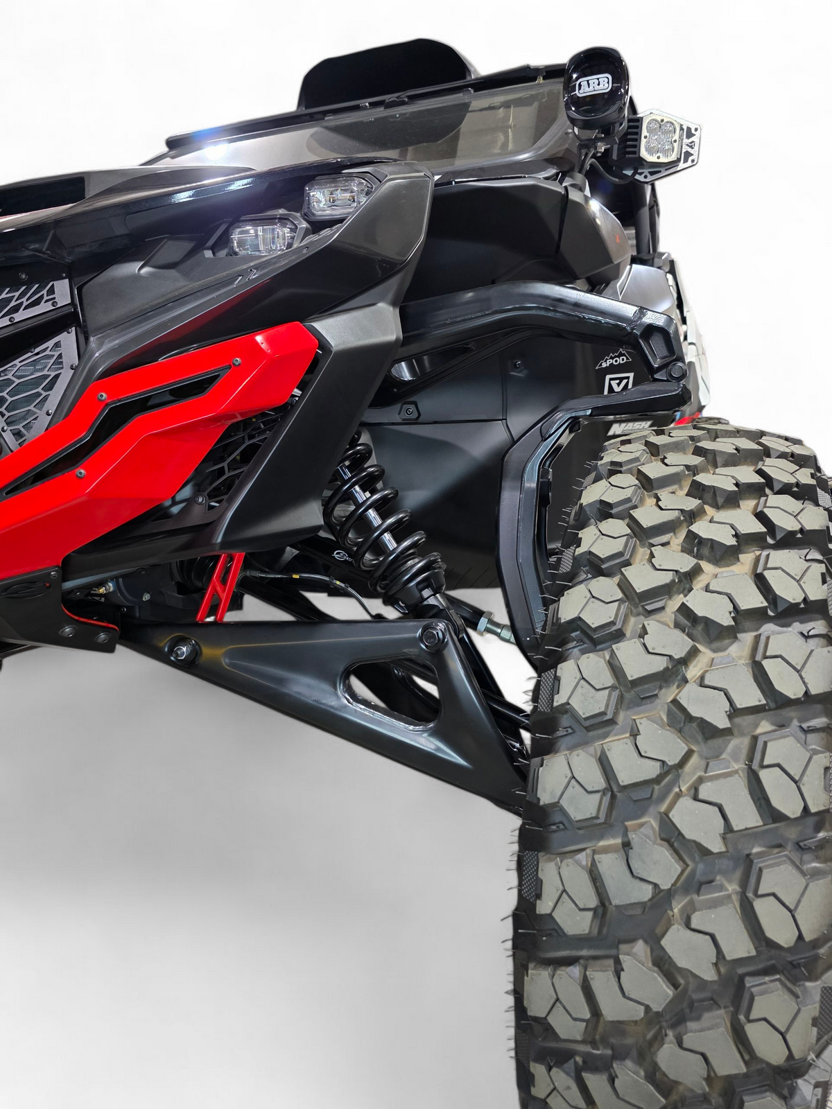 Anodized black billet tie rods installed on Can-Am Maverick R front steering