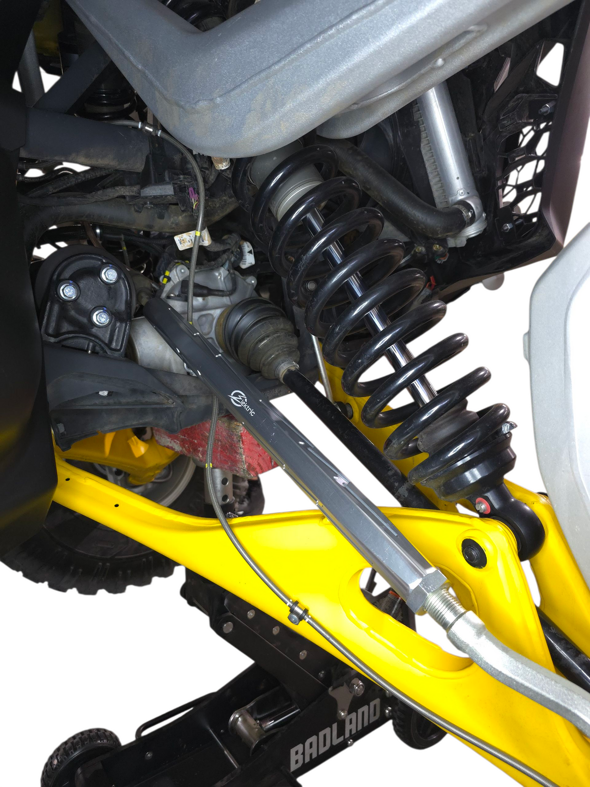 Close-up of the billet machining on a Can-Am Maverick R clear anodized tie rod