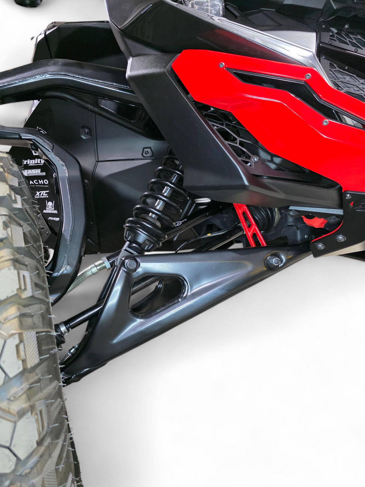 Tie rod end and joint detail on Can-Am Maverick R billet tie rod