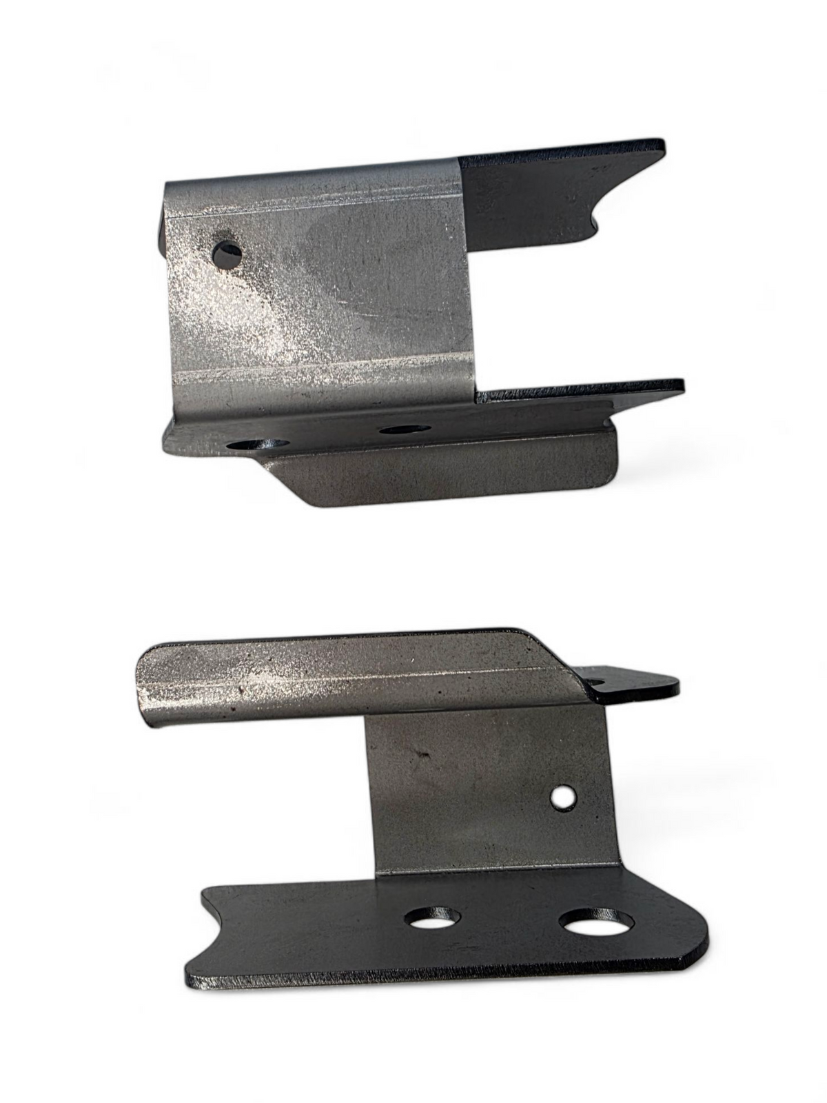 Weld-in trailing arm pivot gusset installed on Can-Am Maverick R reinforcing the trailing arm mount pocket