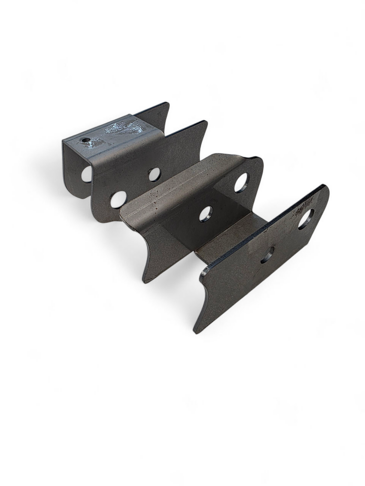 Can-Am Maverick R trailing arm pivot gusset shown fitted to the factory frame mount before welding