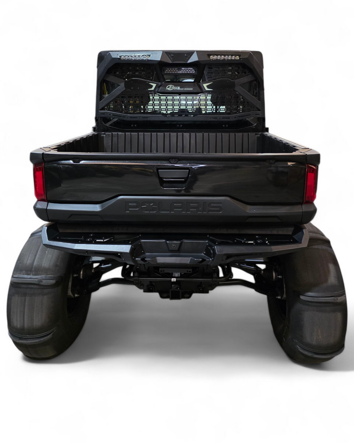 Black pickup truck with open tailgate on a white background