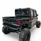 Black off-road truck with large tires on a white background