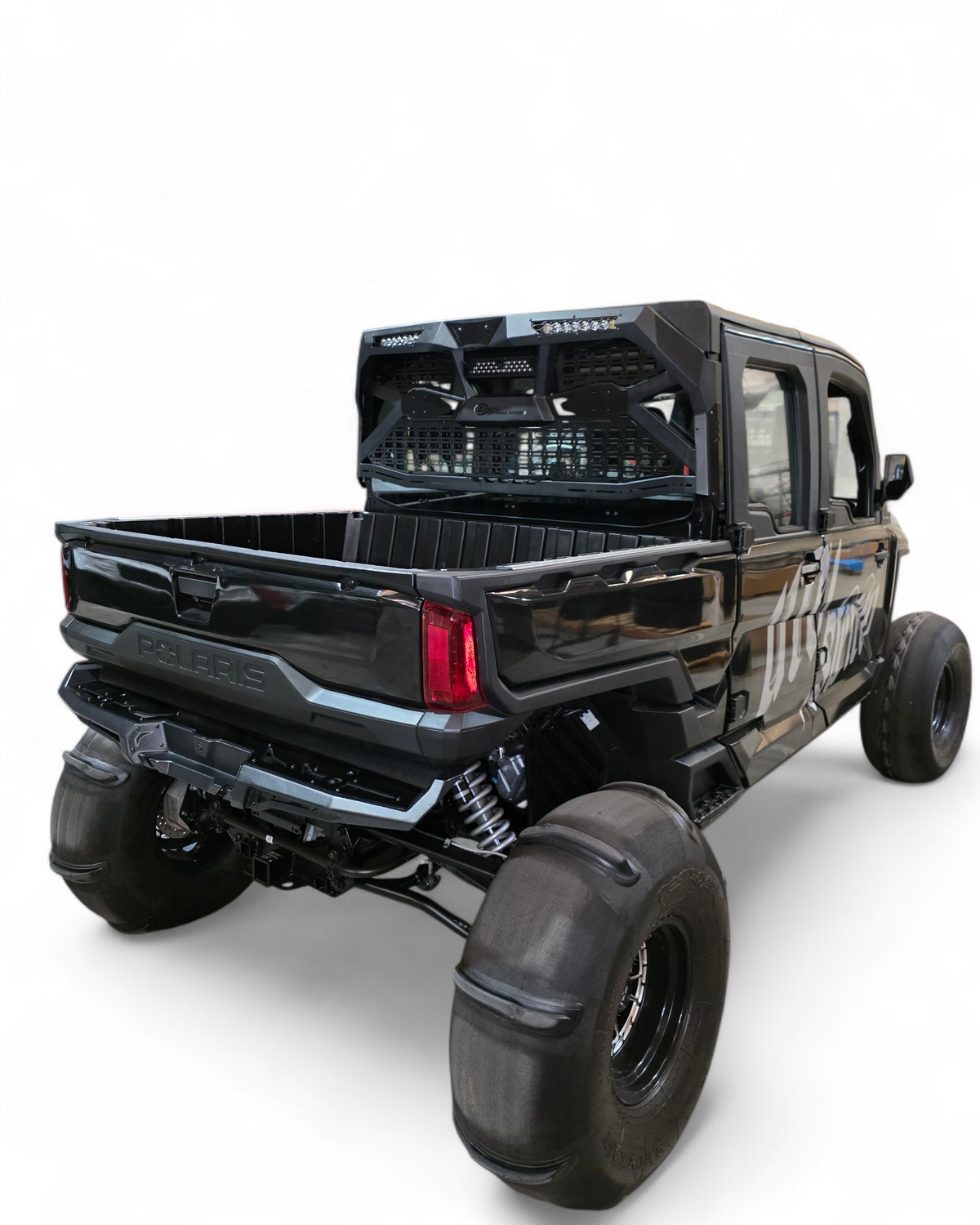 Black off-road truck with large tires on a white background