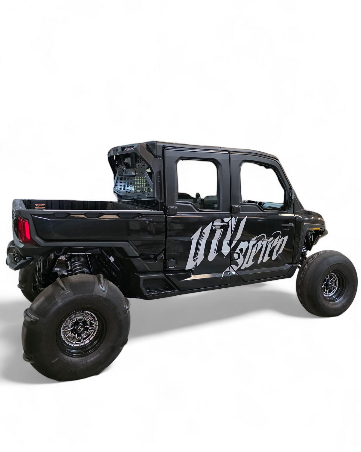 Black off-road vehicle with 'UTV Stereo' branding on a white background