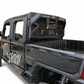 Black pickup truck with open bed on a white background