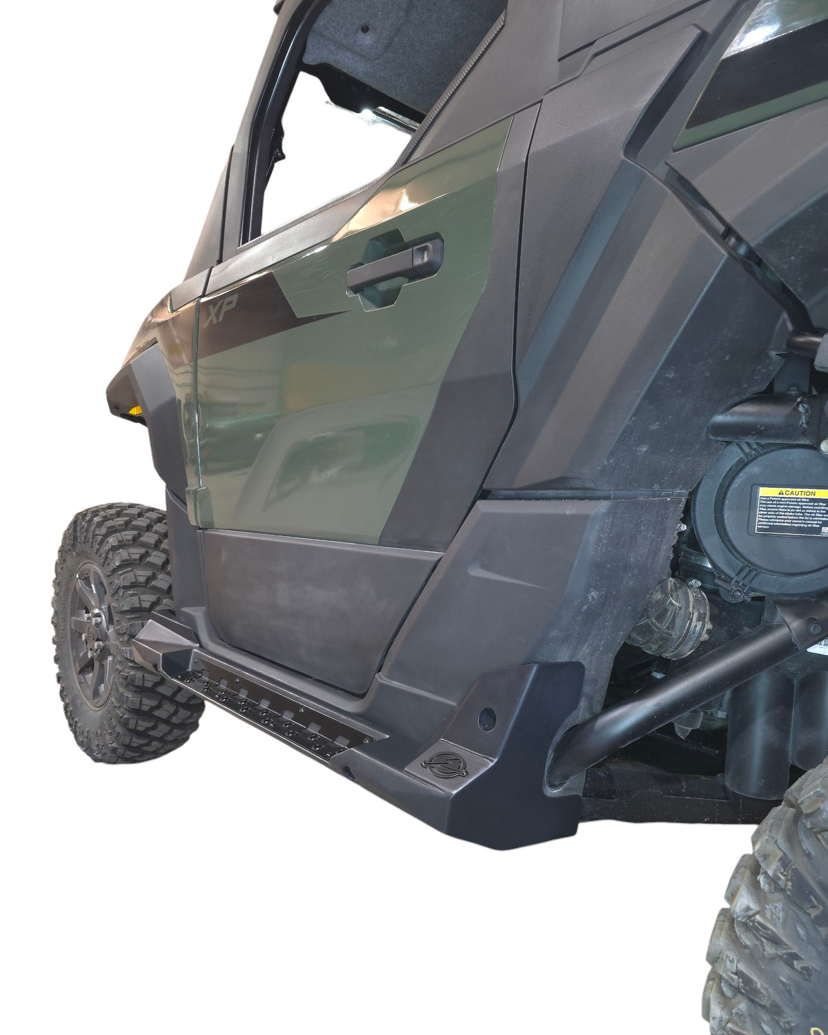 Passenger side rock step on Polaris Xpedition showing frame protection