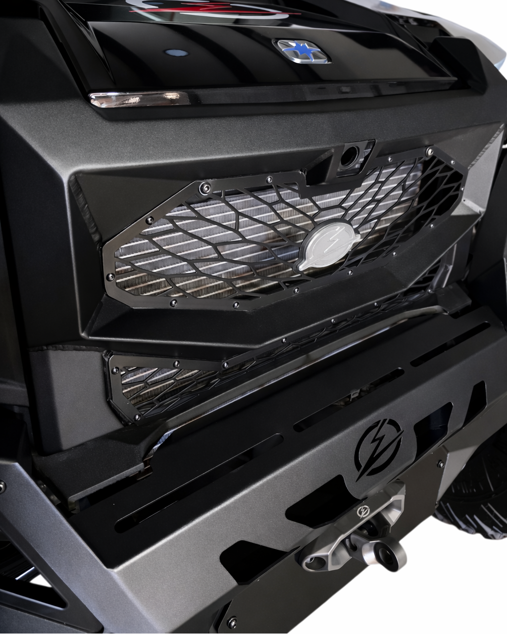 Hammer black shell and satin black mesh two-tone finish on Polaris Xpedition grille