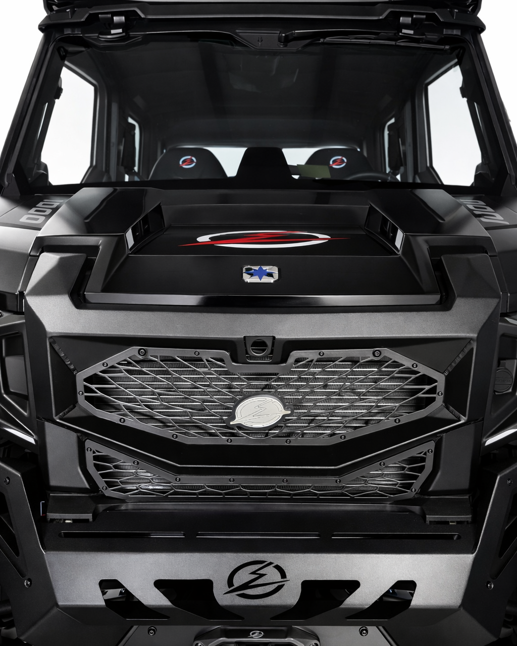 Volt Front Grille installed on 2024 Polaris Xpedition showing rigid steel 3-piece design with billet badge