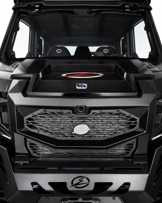 Volt Front Grille installed on 2024 Polaris Xpedition showing rigid steel 3-piece design with billet badge