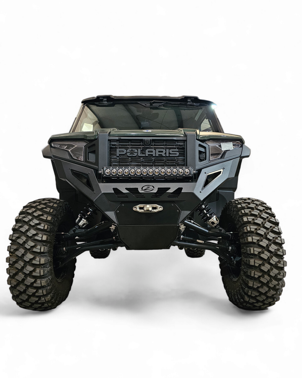 Direct front view of Polaris Xpedition Volt Series Winch Bumper showing 20-inch light bar mounting location and symmetrical design