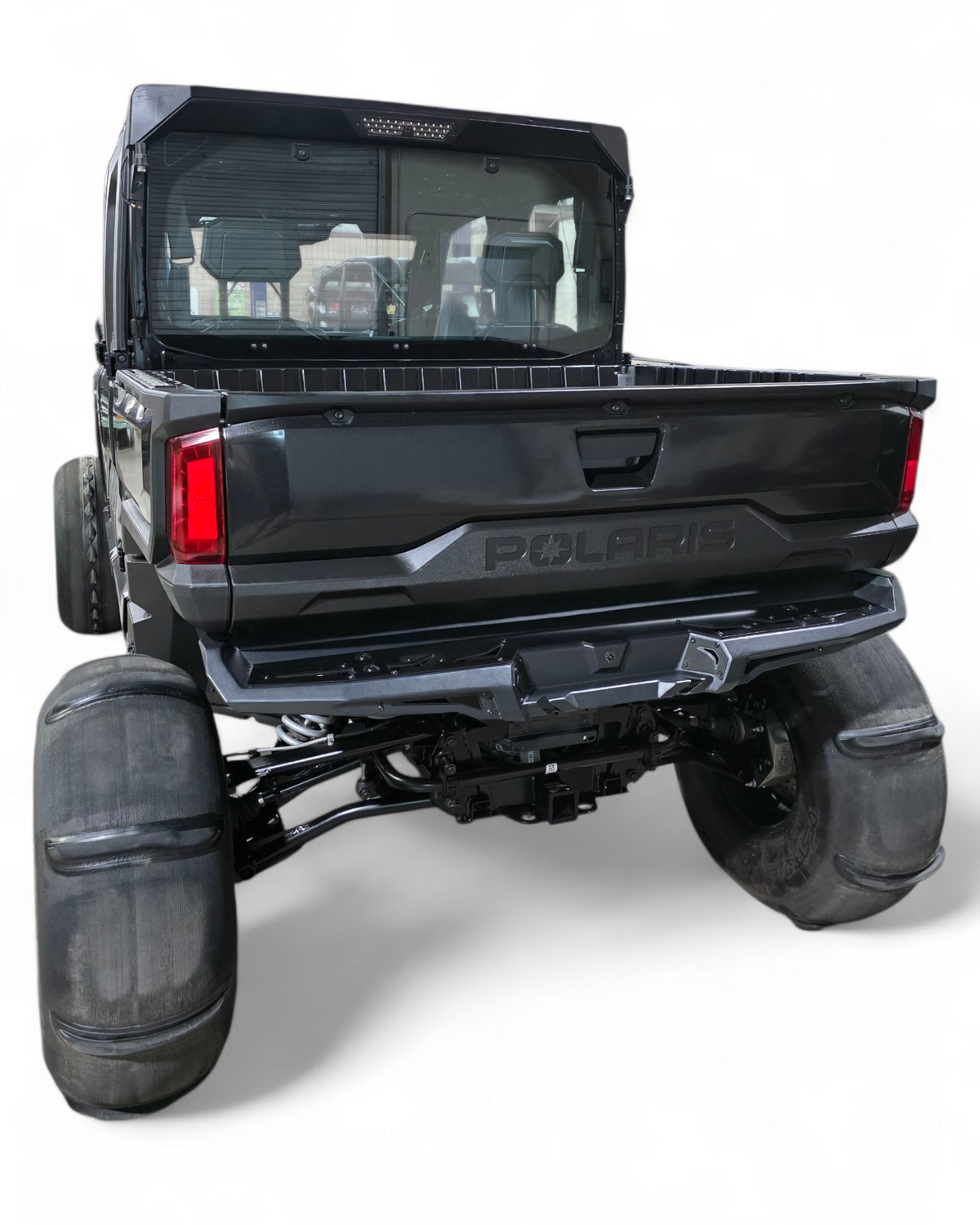 Bed tilt clearance shown with Volt rear bumper on Polaris Ranger XD 1500