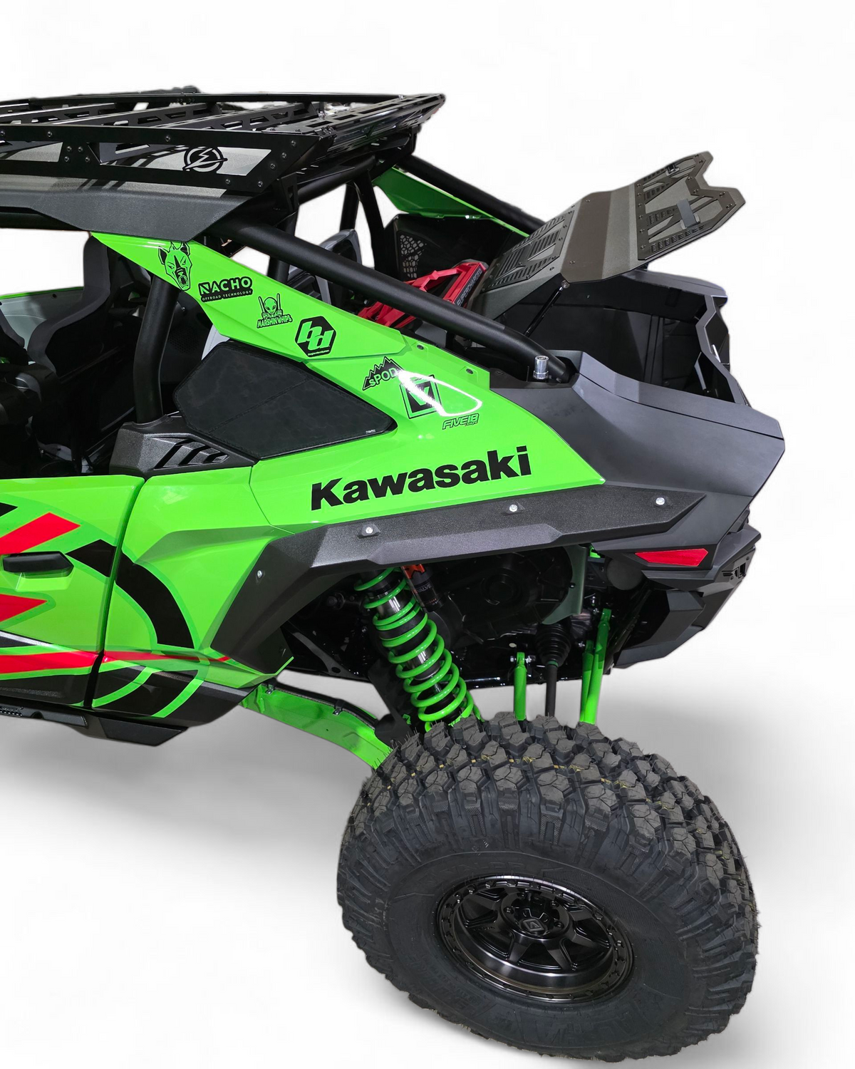 Green Kawasaki off-road vehicle on a white background